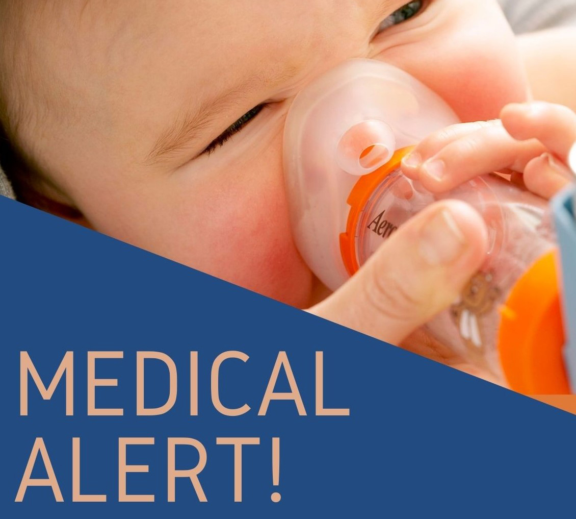 Baby using an inhaler