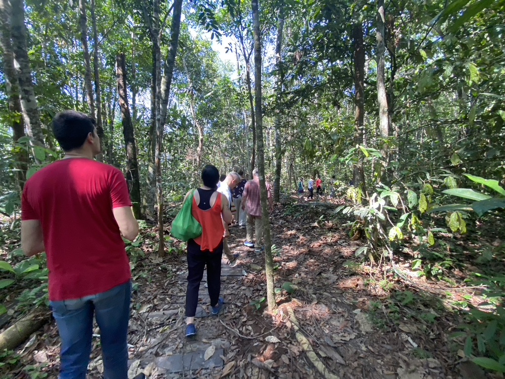UW Madison Delegation hiking through Amazon jungle to visit maloka "Casa Hija," Sept 2023