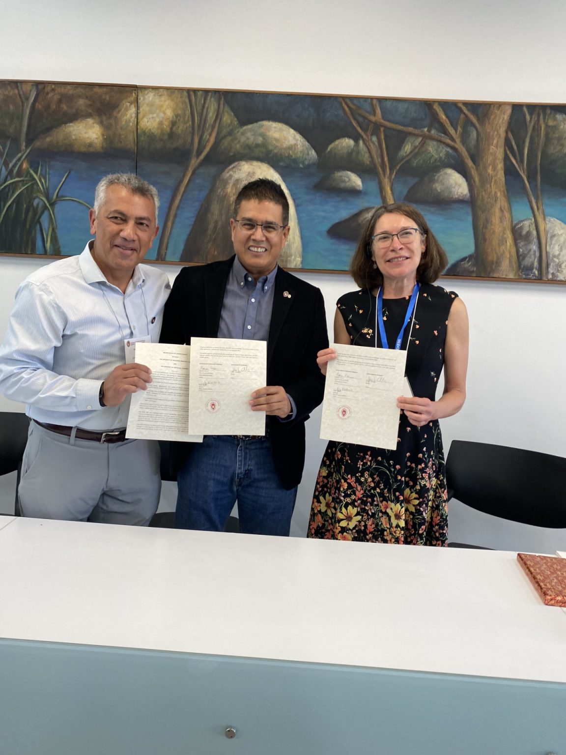 MOU signing with UW Madison GHI Jorge Osorio, UdeA Chancellor John Jairo Arboleda Cespedes, and UW Madison Vice Provost & International Division Dean Frances Vavrus, Sept 2023