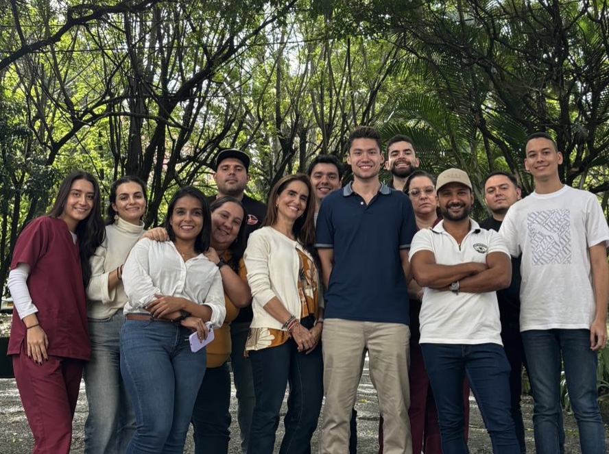 Jonathan Bryan poses with members of GHI One Health Center-Colombia (Photo from J. Bryan)