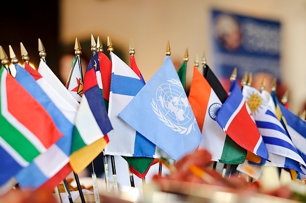 Mini flags of the world on a table History timeline page photo