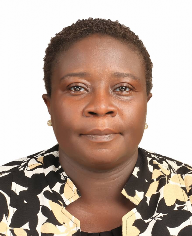 Headshot of Prof Abimbola Adepeju Sowemimo; woman with black hair wearing a black oand white shirt against a white background