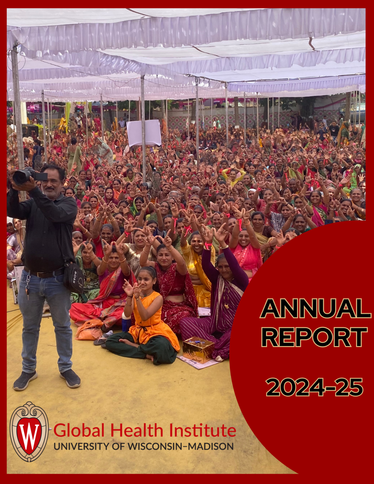 Cover of GHI 2024-25 Annual Report, red background with GHI logo and black text with gold boarder, group of women sharing the UW "W" sign and a cameraman standing with a camera
