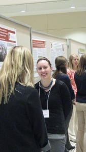 Faculty, staff, students and community members gather for the annual Global Health Symposium poster session.