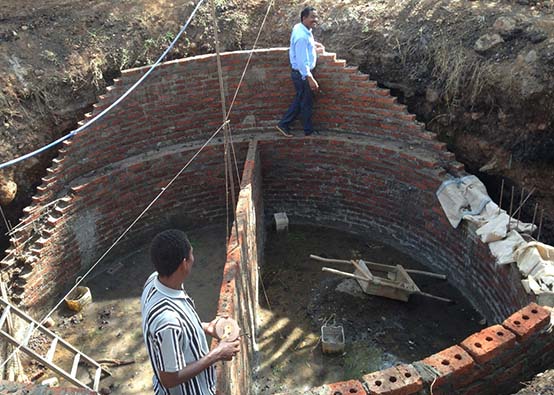 Ethiopia leads the world with its commitment to reduce carbon emissions by two-thirds. Biodigesters, such as the one shown here, are among the energy alternatives that will help power villages.