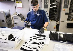 UW-Madison publishing and printing team makes face shields for UW Hospital workers