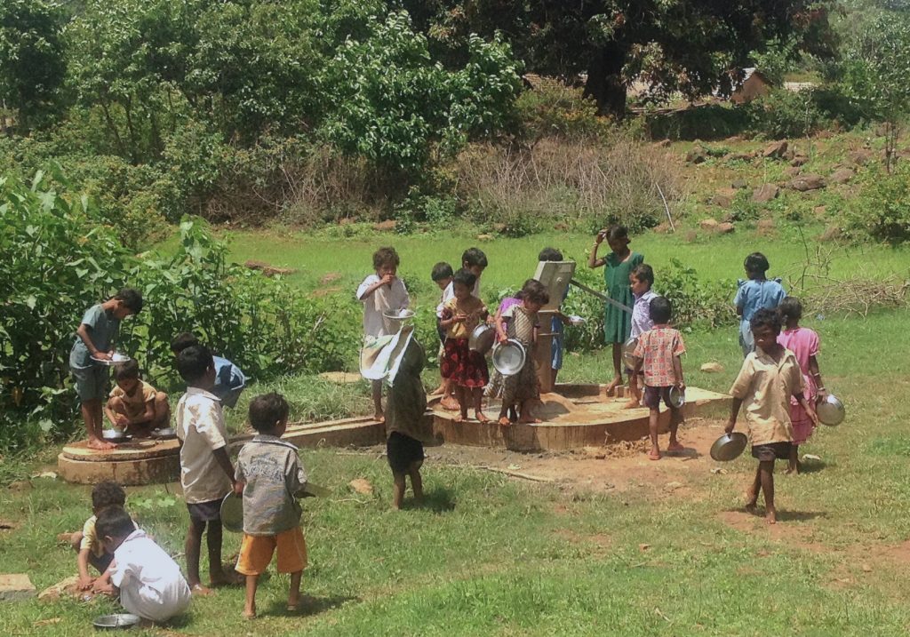 children gathering in an open area